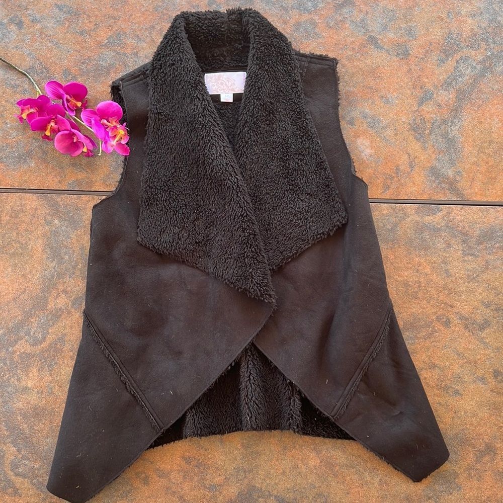 black furry vest